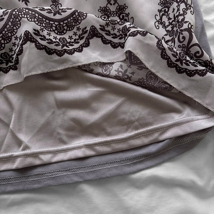 ‘Axes Femme’ Flowy Purple Top