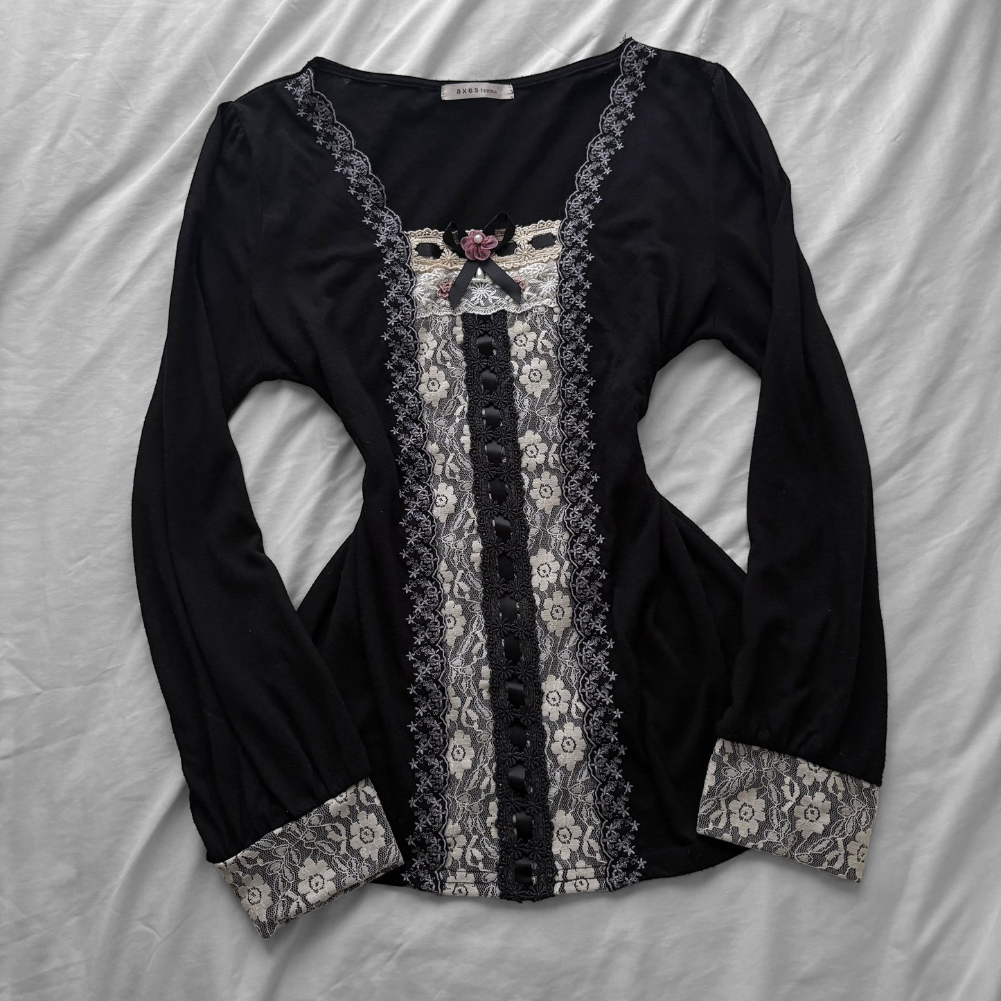 ‘Axes Femme’ Black Top with White Lace Details