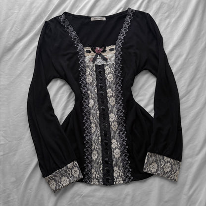 ‘Axes Femme’ Black Top with White Lace Details