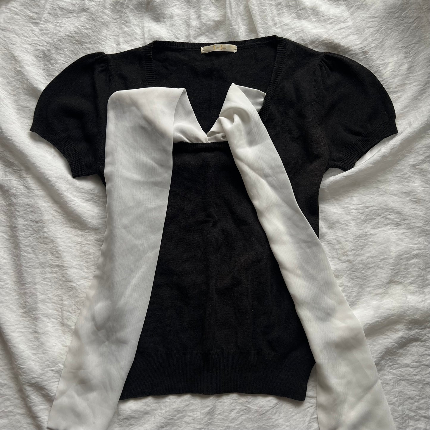 Black removable bow knit