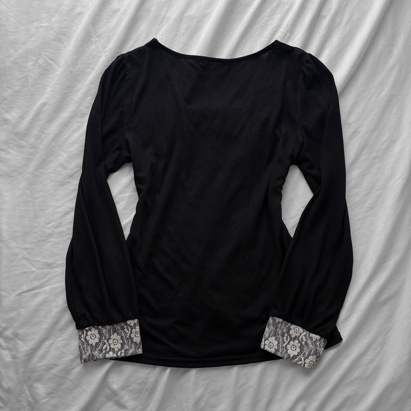 ‘Axes Femme’ Black Top with White Lace Details