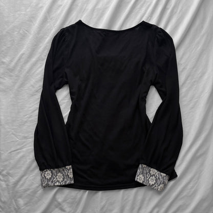 ‘Axes Femme’ Black Top with White Lace Details