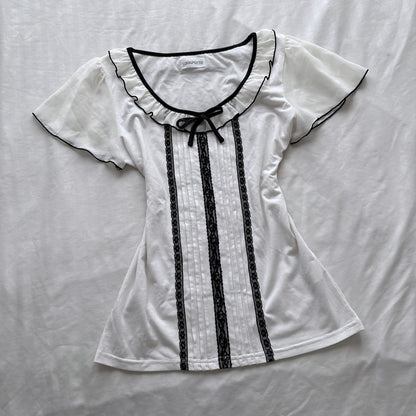 Ivory top with frilly sleeves & neckline