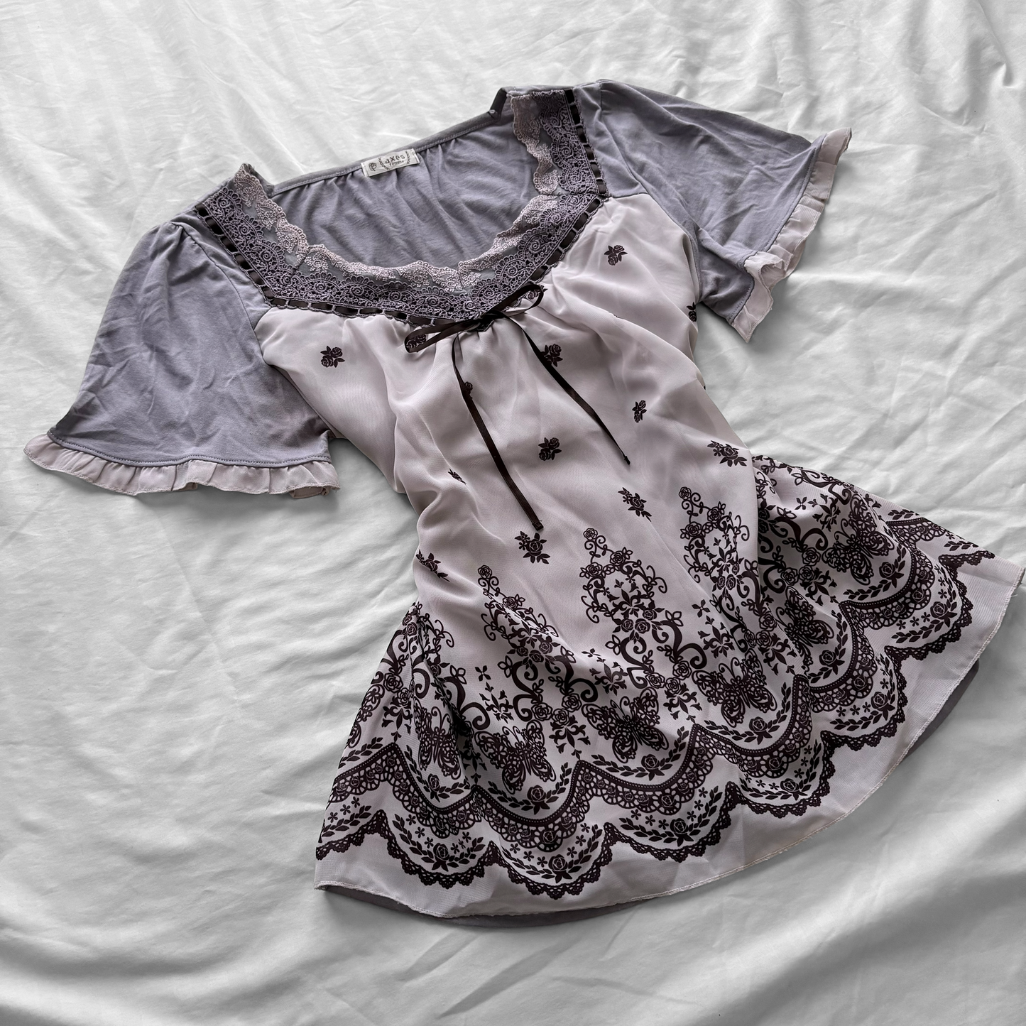 ‘Axes Femme’ Flowy Purple Top