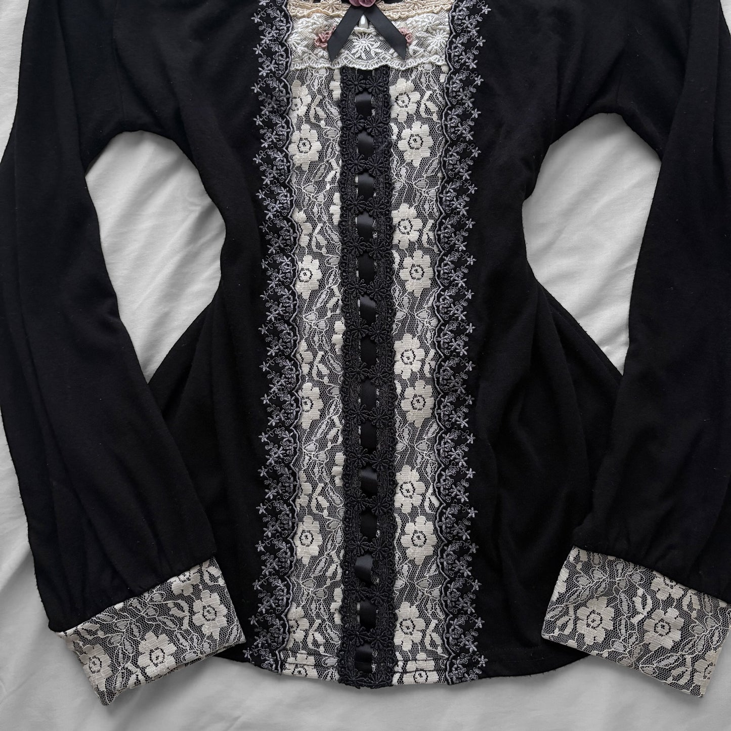 ‘Axes Femme’ Black Top with White Lace Details
