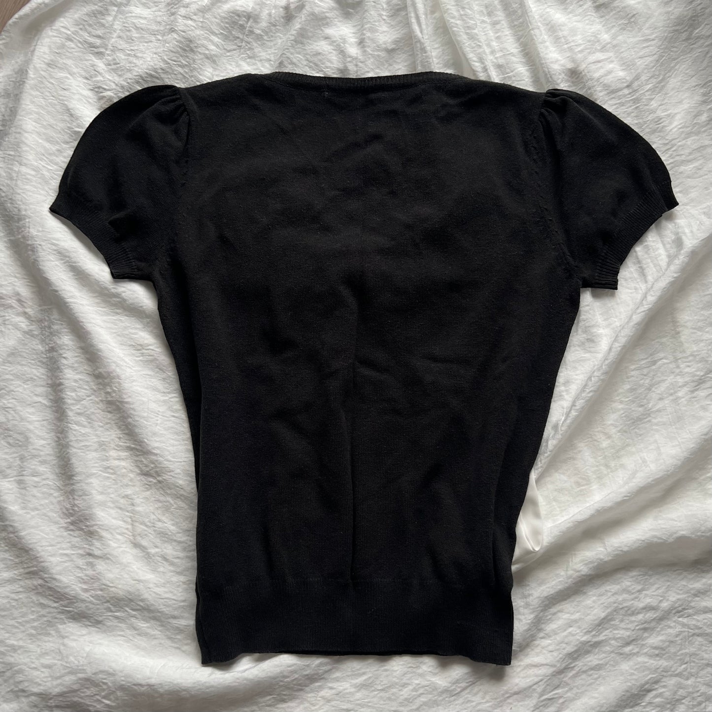 Black removable bow knit