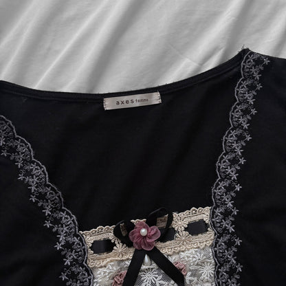 ‘Axes Femme’ Black Top with White Lace Details