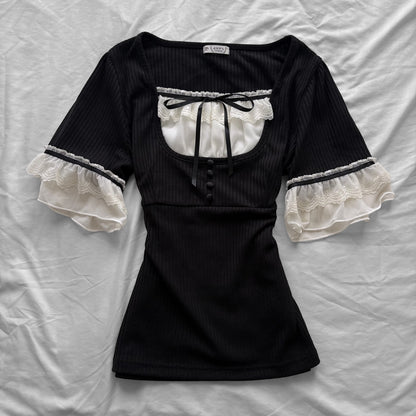 ‘Axes Femme’ Black Top with White Lace