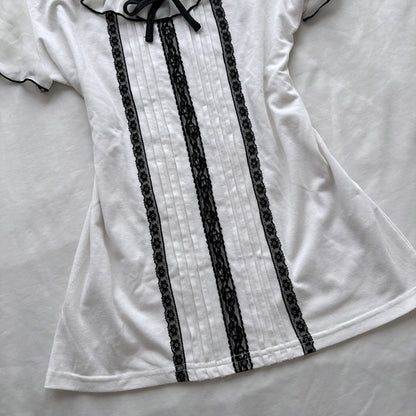 Ivory top with frilly sleeves & neckline
