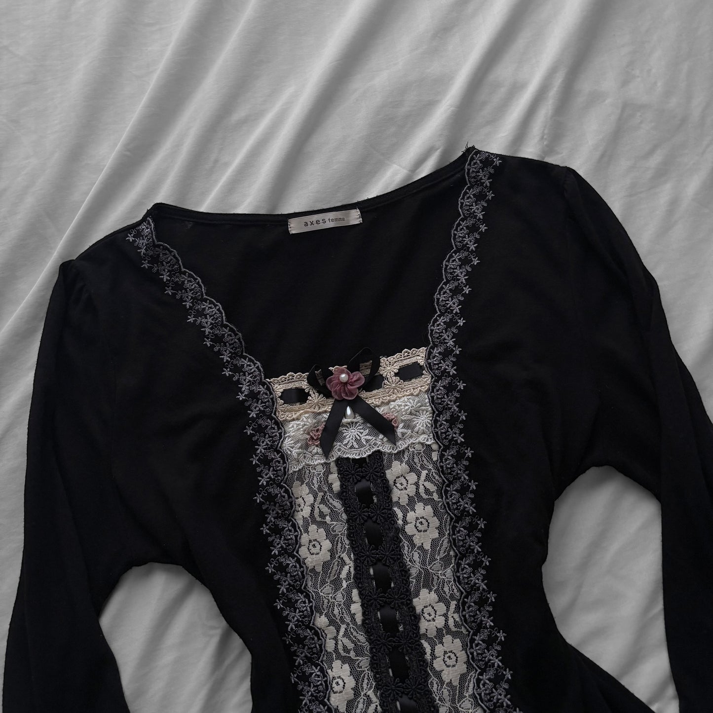 ‘Axes Femme’ Black Top with White Lace Details
