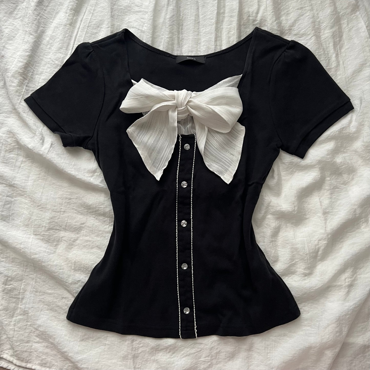 Black front ribbon top